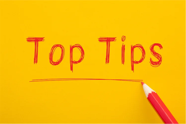 Bright yellow background with “Top Tips” written in red crayon to highlight PSLE strategy advice.